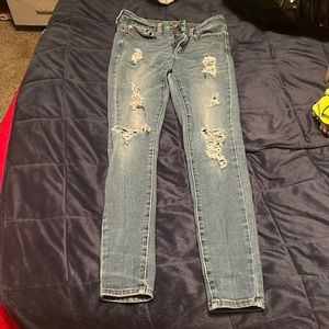 Size 4 for high rise jeans, they don’t fit me anymore and I don’t wear them.